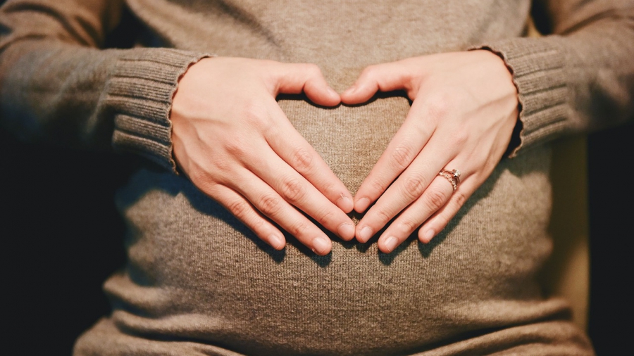 pregnant heart hands